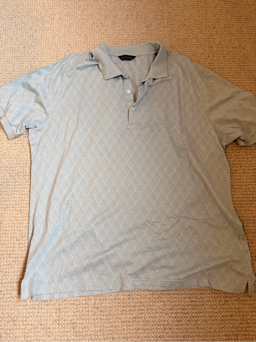Men's Light Blue Polo Shirt with Subtle Pattern